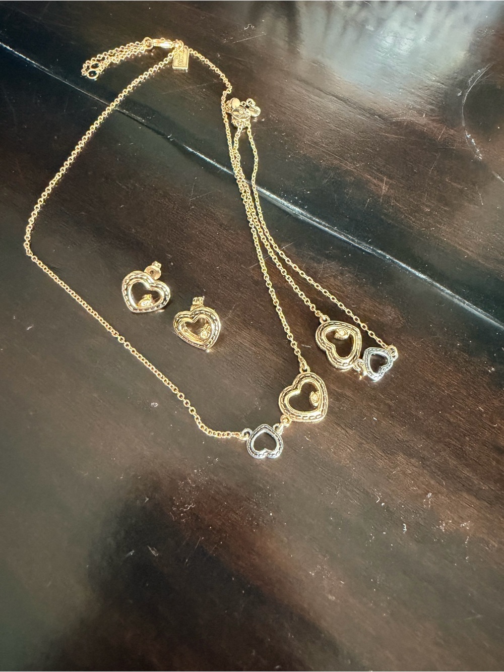 Coach Gold-Tone Heart Pendant Necklace with Matching Heart Studs and bracelet